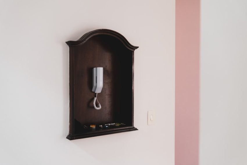Photo matte black wall sconce